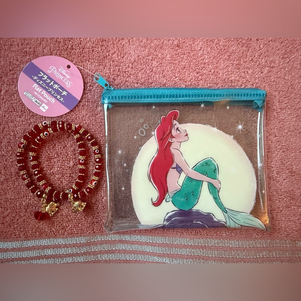 2 beaded bracelets and 1 small The little mermaid bag.